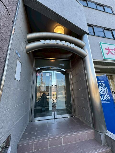 須賀マンション 303エントランス